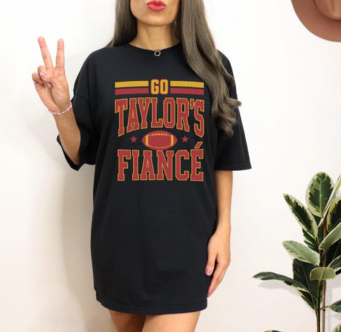 Go Taylor’s fiancé tee
